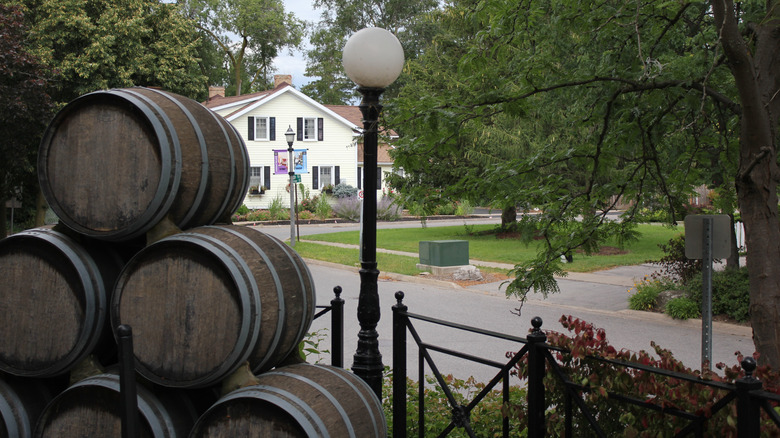 Jordan's Main Street with red brick buildings, trees and wine cask decorations