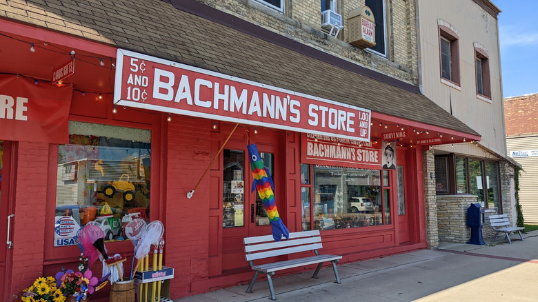 The bright red facade and window displays at Bachmann's Store in downtown Central Lake, Michigan