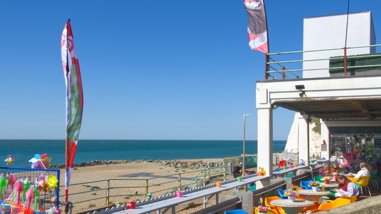 Beachfront cafe overlooking Saltdean Beach, East Sussex, England.