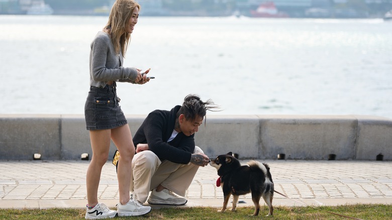 Owners with dog, Hong Kong