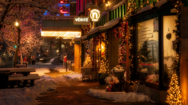 The sidewalk of Main Street covered in snow during the Christmas season in Bexley, OH