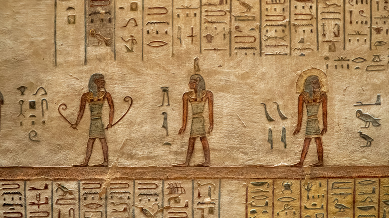 Ancient Egyptian hieroglyphics on a stone tablet