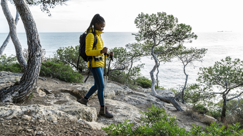 A person hiking on rocky terrain