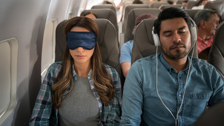 People napping on plane