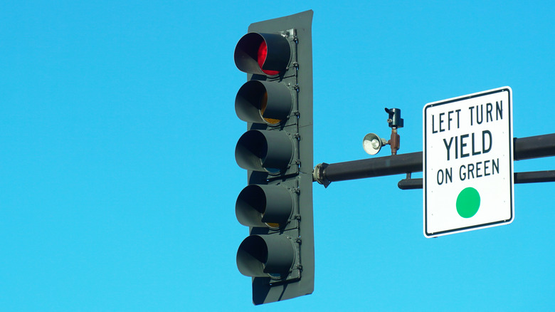 Left turn yield sign at intersection