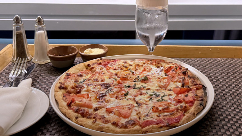 A plate of pizza on a tray at the InterContinental Boston hotel