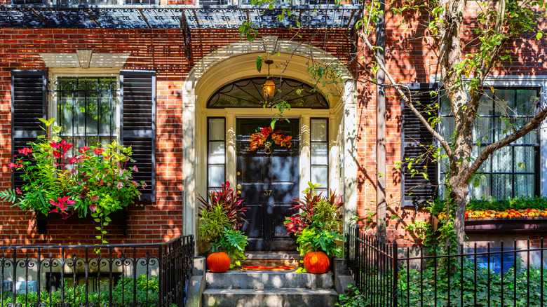 Elaborate facade of a home decorated for fall in Beacon Hill, Boston