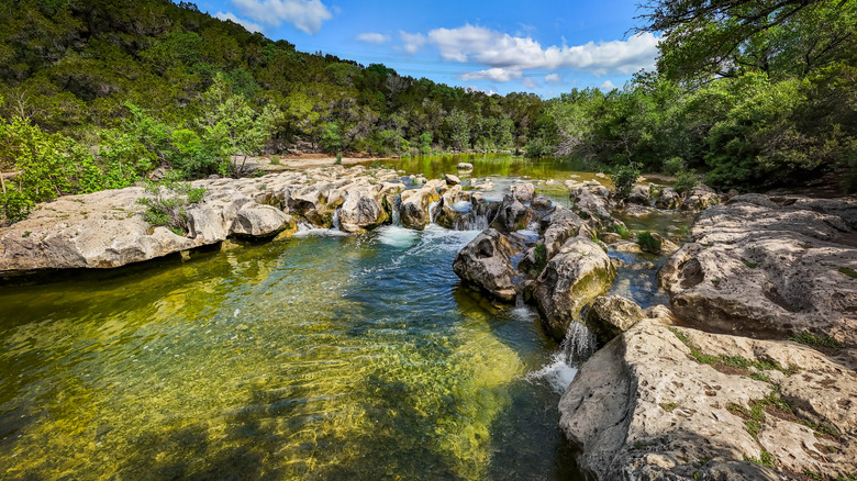 Scenic aerial view of Sculpture Falls via Barton Creek Greenbelt Trail in Austin