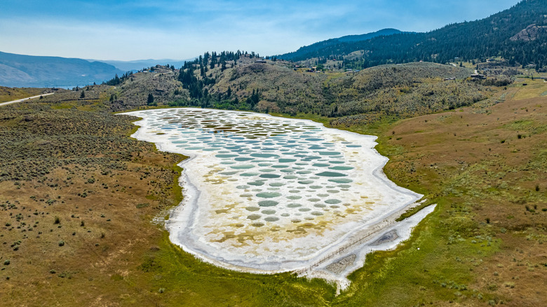 White lake with pools of water in spots