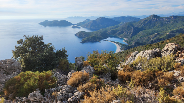 A rocky slope overlooking a bay on the Lycian Way in Turkey