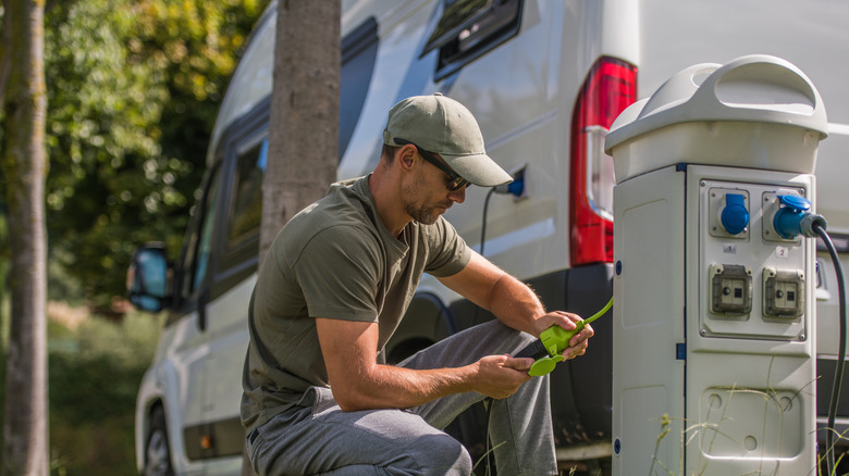 man using RV hookup