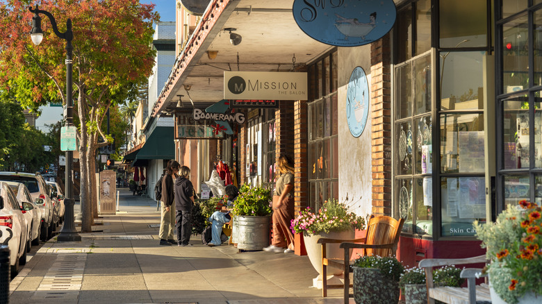People walk along the downtown retail shopping district and business area of Petaluma