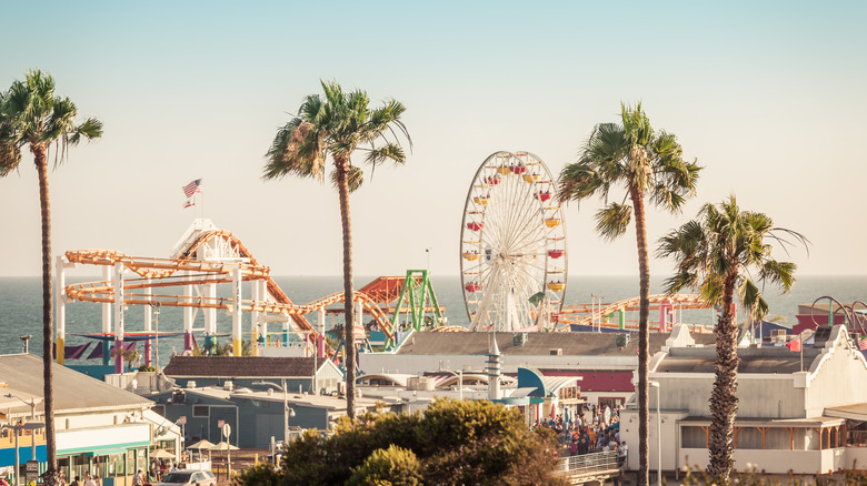 Famous amusement park with ferris wheel in Santa Monica, California