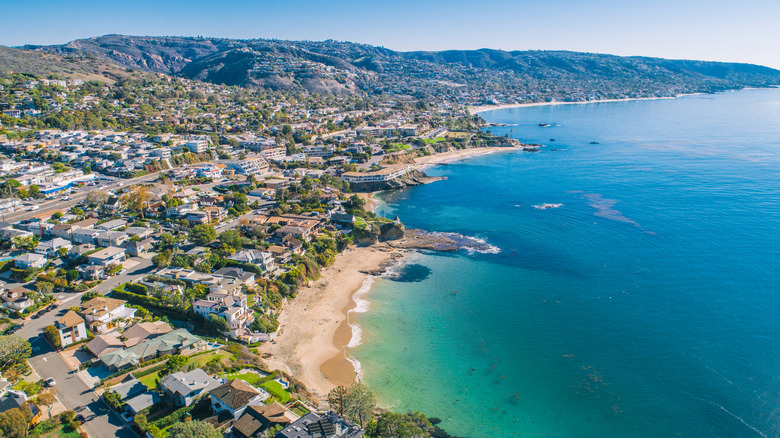 Aerial view of coastline with beaches and buildings in Orange County, California