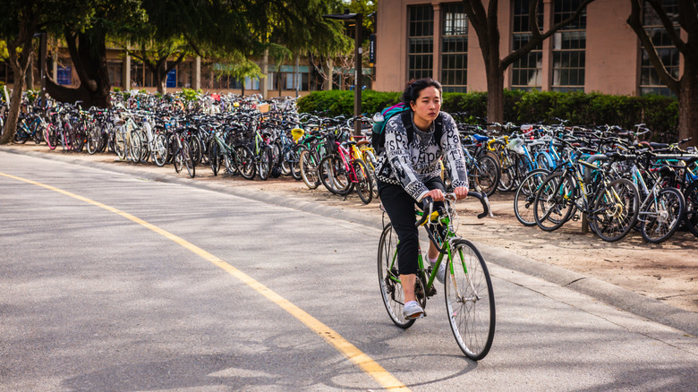 A person cycles on a cycle path in the college town of Davis, CA