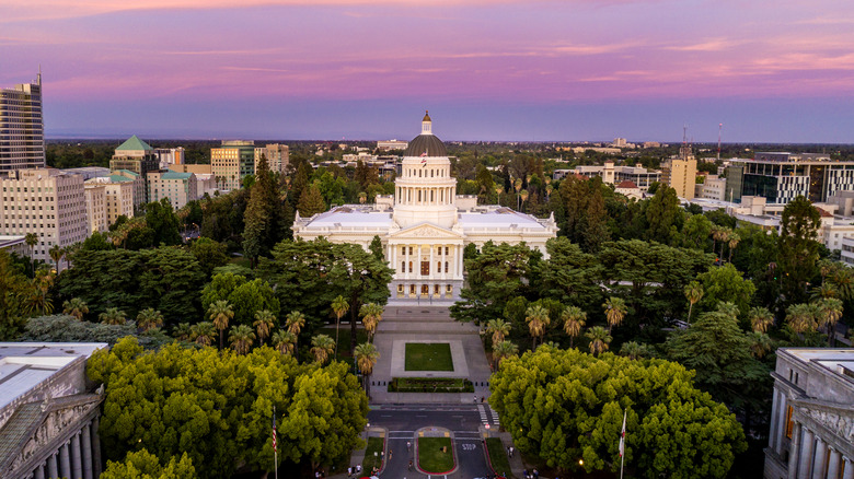 View of Sacramento with California State Capitol building during sunset