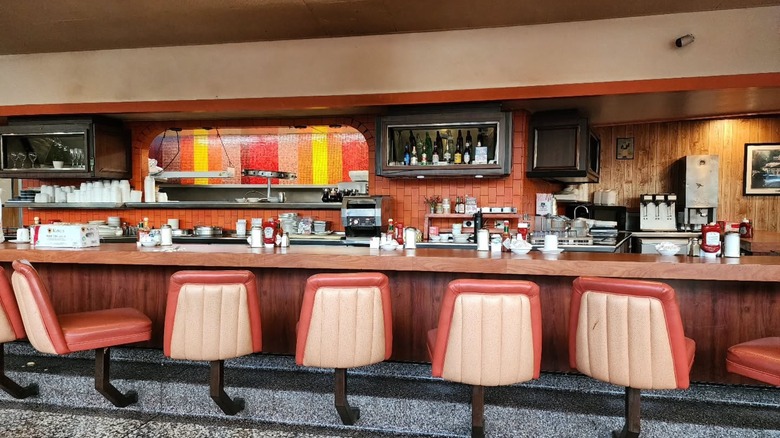 Retro stools at a diner counter in Astro Family Restaurant, California