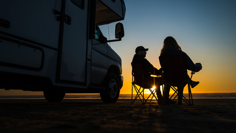 RV campers watching the sunset