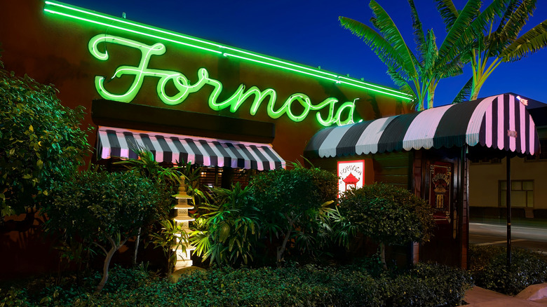 The neon jade-green signage on the exterior of The Formosa Café, Hollywood