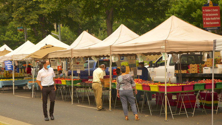 Stalls with fresh produce at Sacramento's Downtown Farmers Market in California