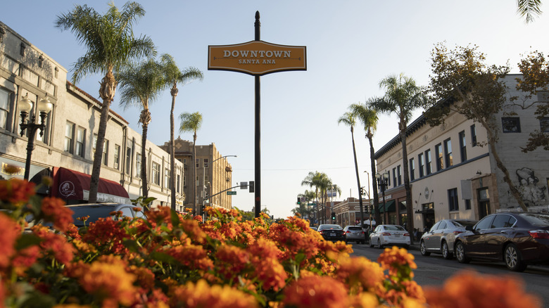 Street view and sign of Downtown Santa Ana with flowers