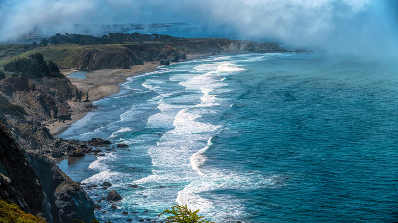 Fog and waves at Ragged Point in Big Sur California