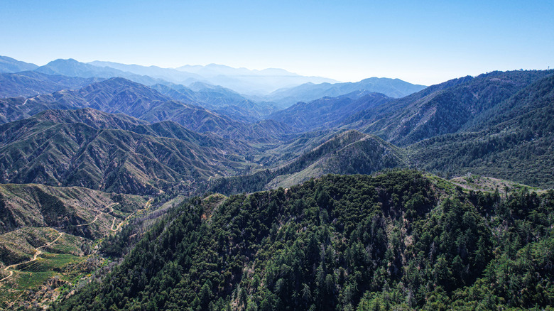 View of mountain range from atop a mountain