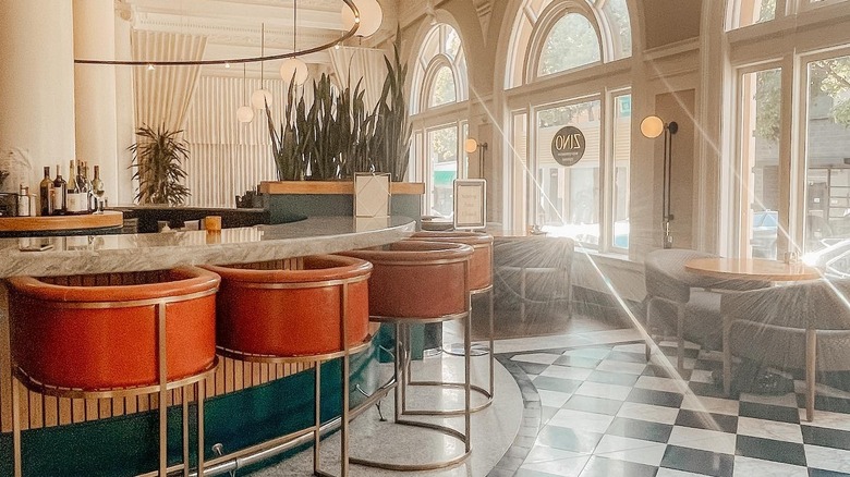 Bar seating and arched windows inside the Hotel Shattuck Plaza in Berkeley