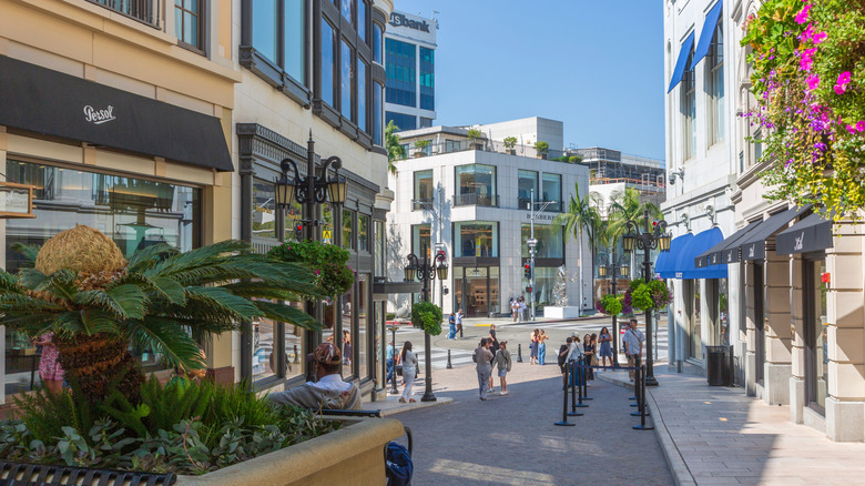 People walking down the Rodeo Drive Walk of Style on a sunny day