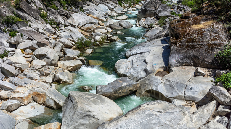 The South Yuba River flows over a series of boulders