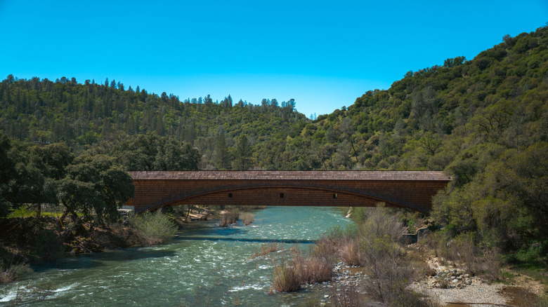 Historic covered bridge over the river