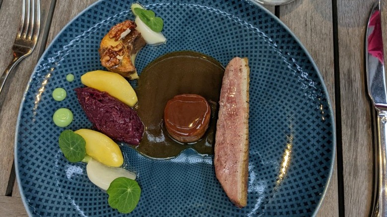 The famous duck entree at South Coast Plaza's Knife Pleat, one of the center's award-winning restaurants