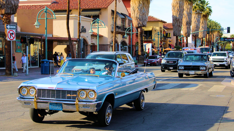 Classic cars cruising down Palm Canyon Drive in Palm Springs, California