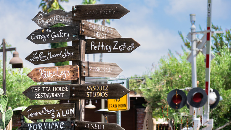 Signs pointing to amenities in the Los Rios District