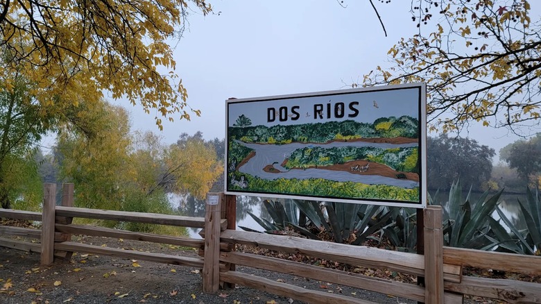 A sign for Dos Rios overlooking the rivers at Dos Rios Ranch State Park, California