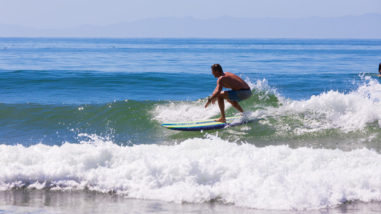 Surfer riding a wave at Rincon Point