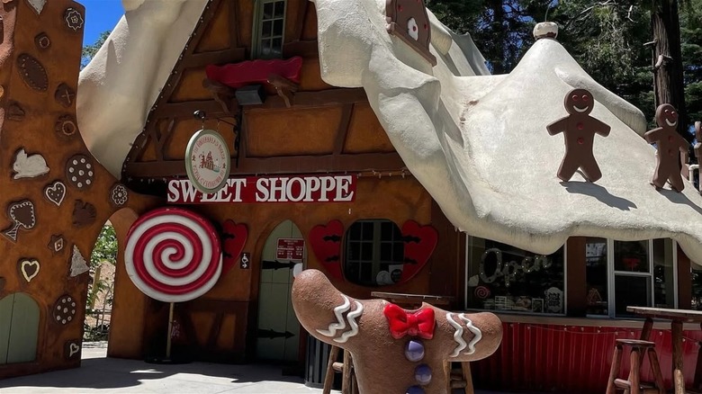 Sweet Shoppe building with fake snow at Santa's Village
