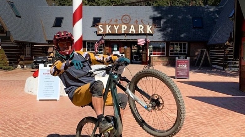 Man on bike outside of Spypark building