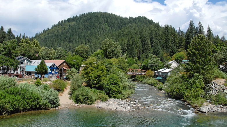 Waters meet beside a pebbly beach in Downieville, CA