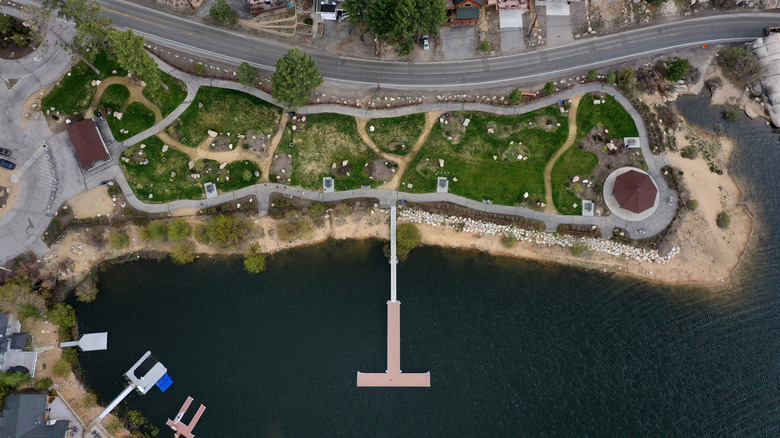 Aerial view of Boulder Bay Park in Big Bear Lake California with a dock extending into the lake.