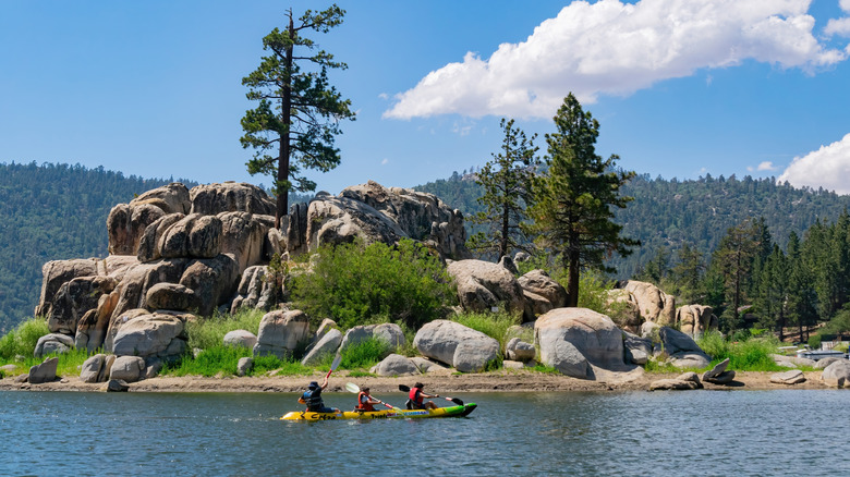 People kayaking on Big Bear Lake at Boulder Bay Park in California.
