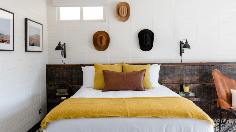 Interior of Cuyama Buckhorn suite with cowboy hats on the wall