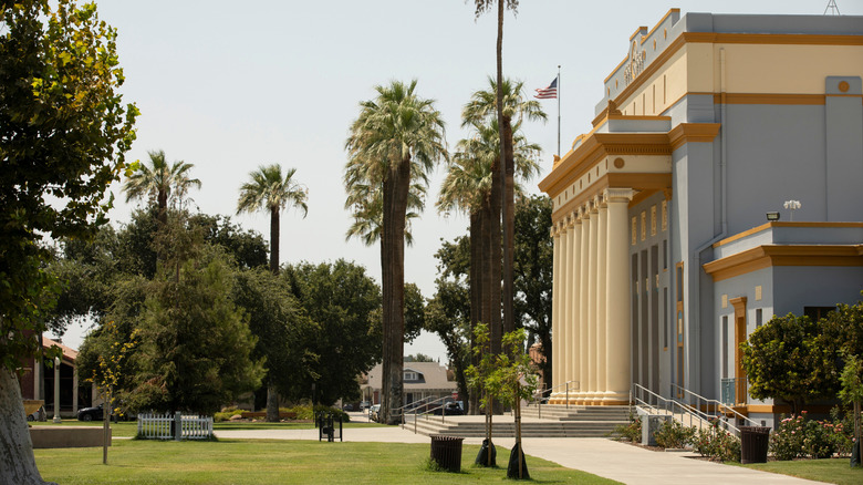 building and palm trees in downtown Hanford, California