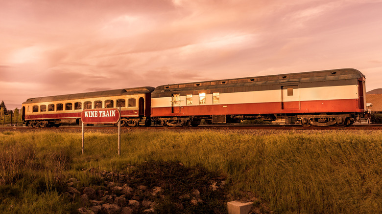 Wine train in Napa Valley with a sunset sky