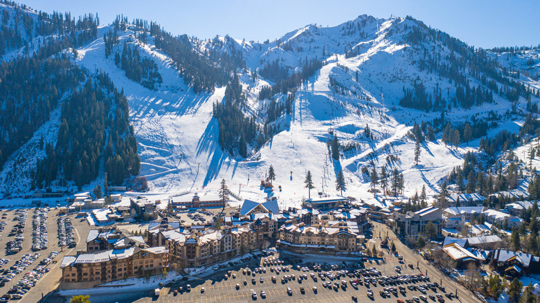 An aerial view of Palisades Tahoe Resort on a sunny day