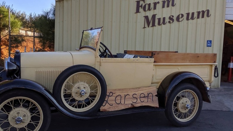 A vintage truck outside of Larsen Pioneer Farm Museum