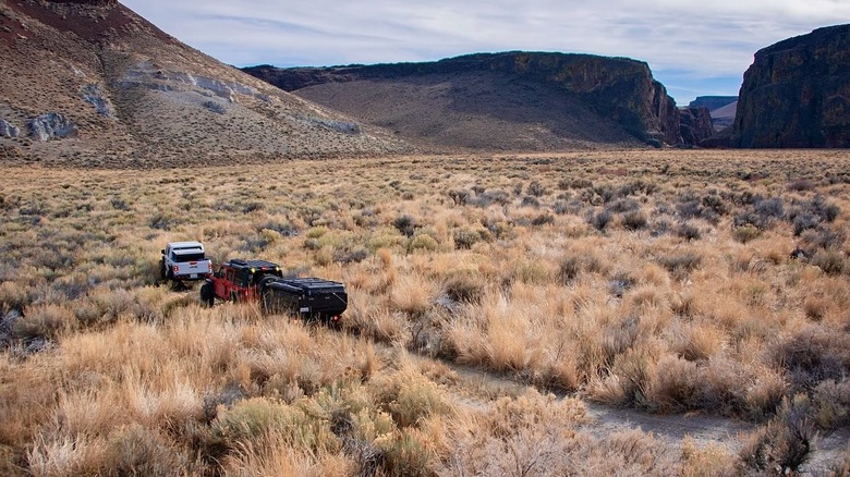 Group of SUVs traveling through the canyon in Nevada