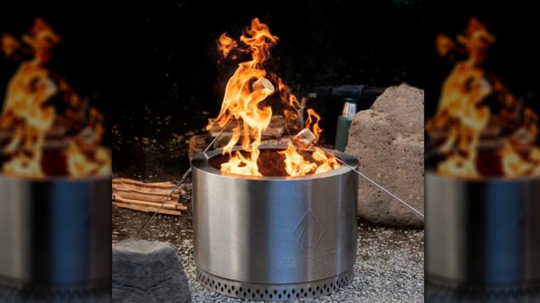 A HotShot Explorer Fire Pit at a campsite