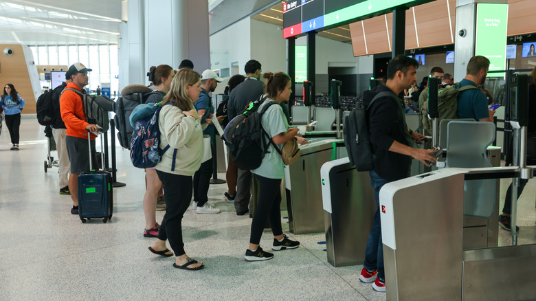 People at airport security point