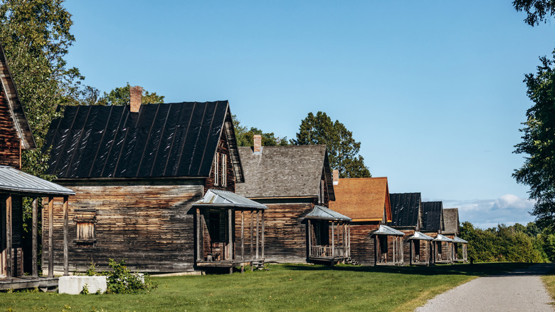 abandoned wooden houses lined up in Val-Jalbert, Quebec